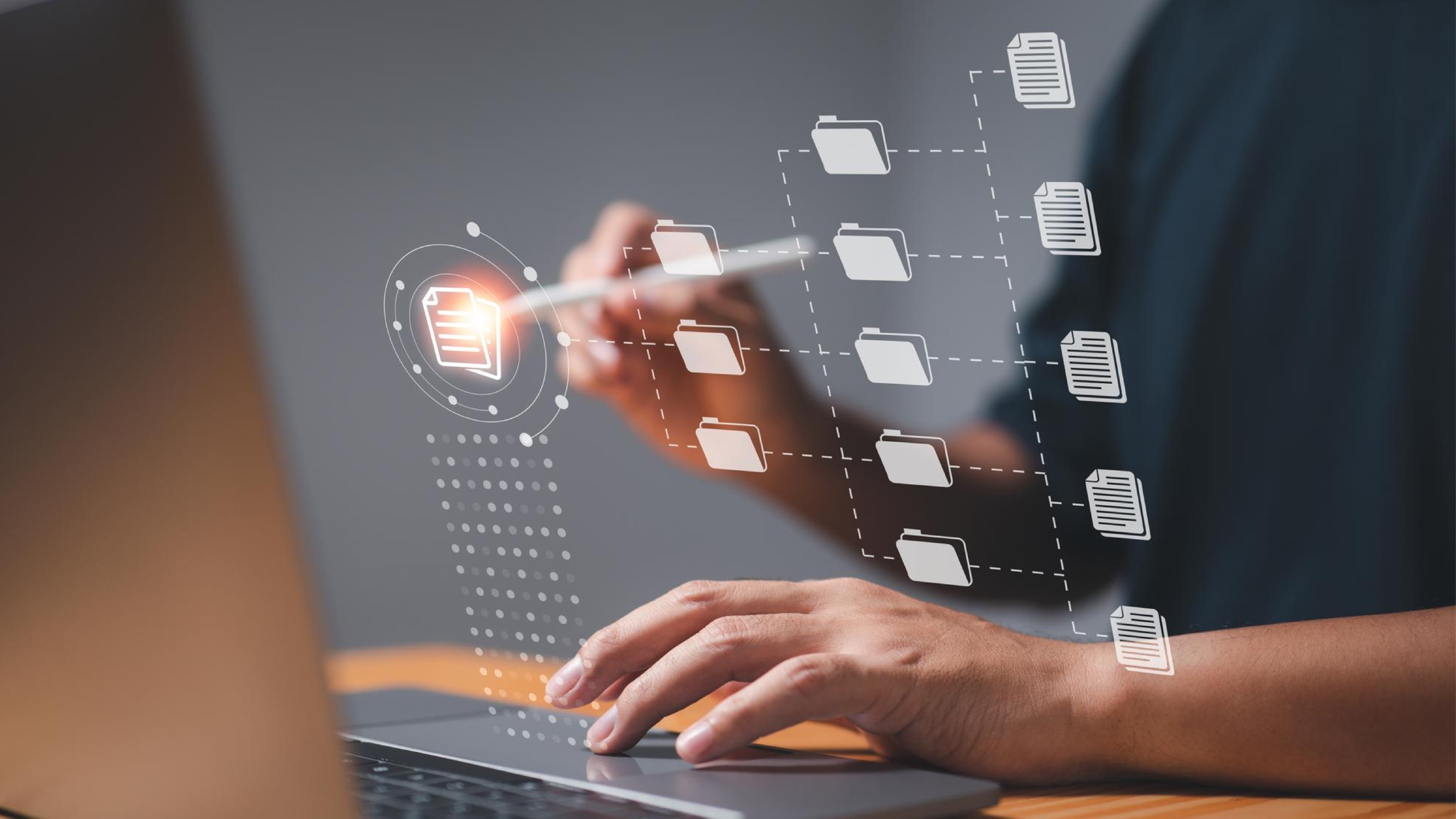 Person using a laptop with illustrated digital folders and documents, symbolizing SMS marketing data handling and organized customer interactions.
