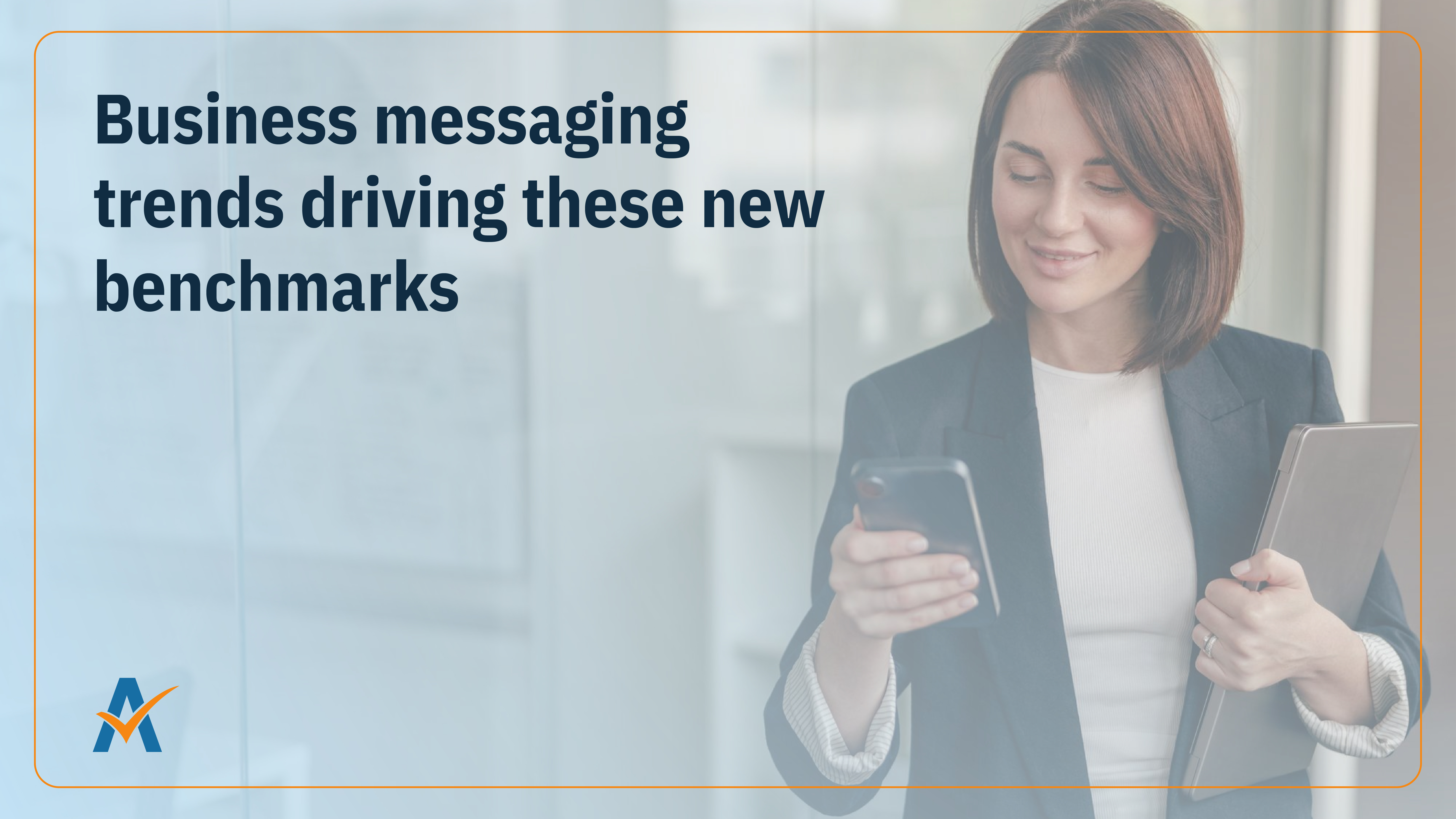 A businesswoman holding a tablet looks at her smartphone with a smile. Overlaid text reads, “Business messaging trends driving these new benchmarks,” indicating that understanding current trends is key to tracking SMS marketing benchmarks.