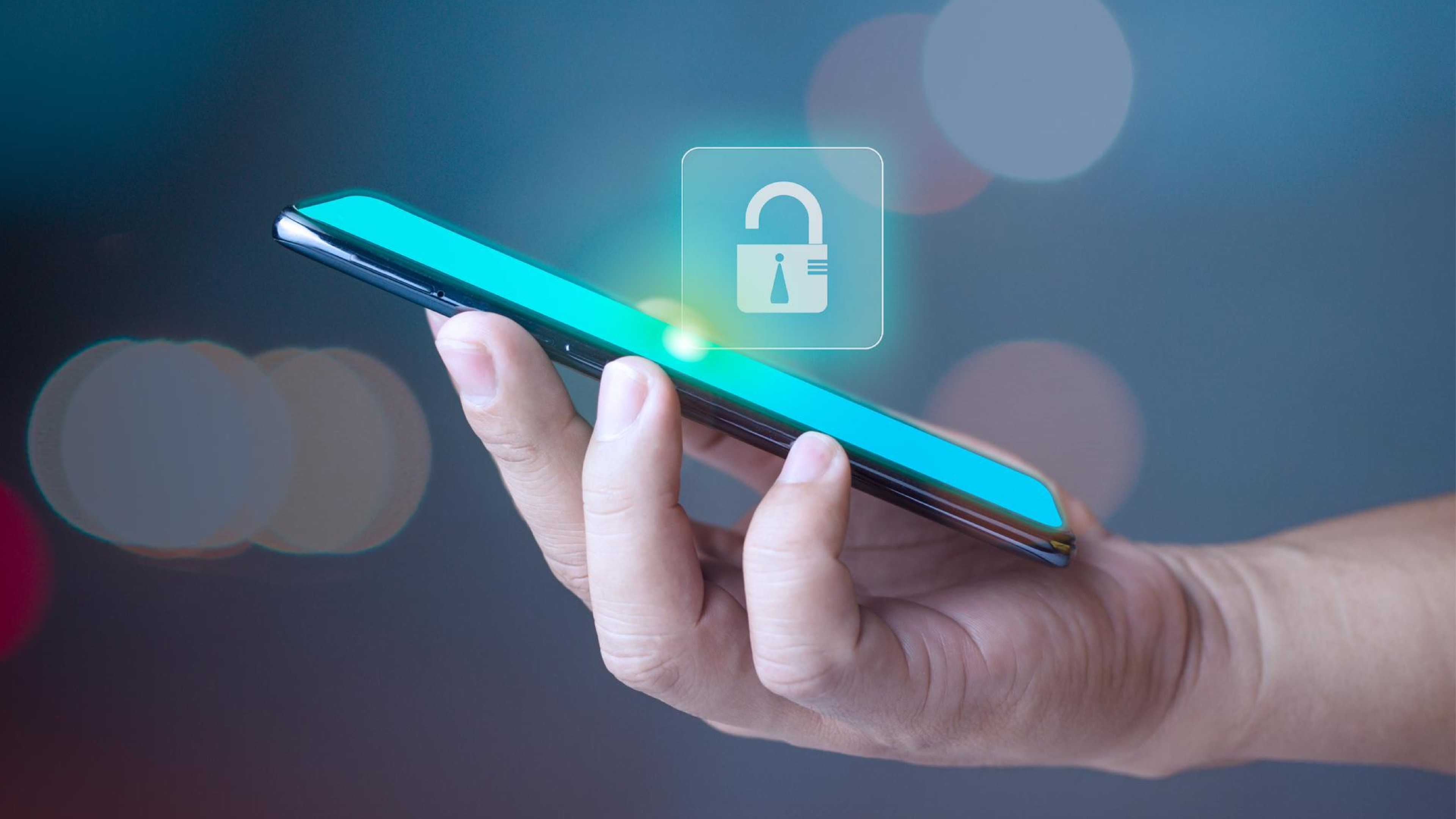 Close-up of a hand holding a smartphone with an unlocked padlock icon, representing SMS opt-in for marketing text messages and handling opt-out requests.